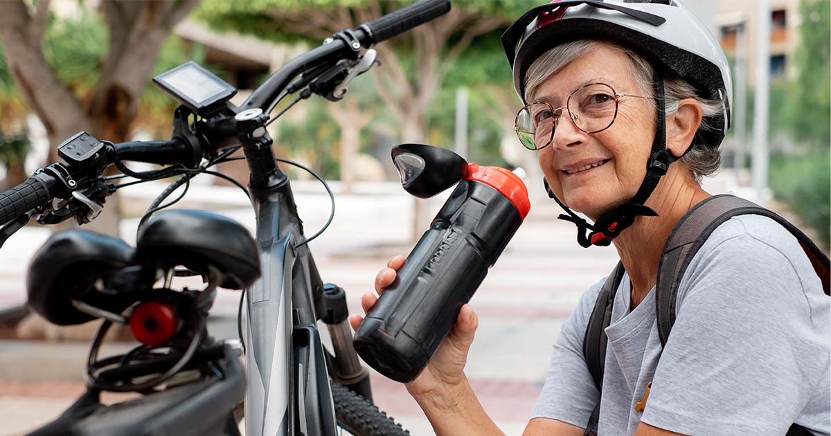 older woman with an electric bicycle