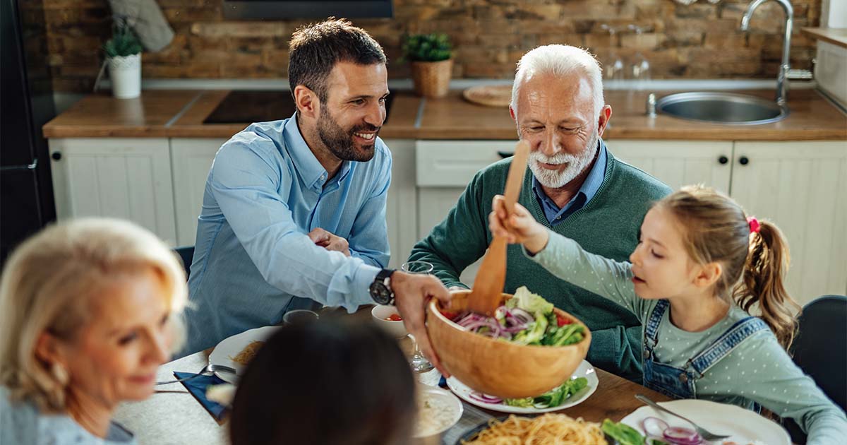 family around table eating