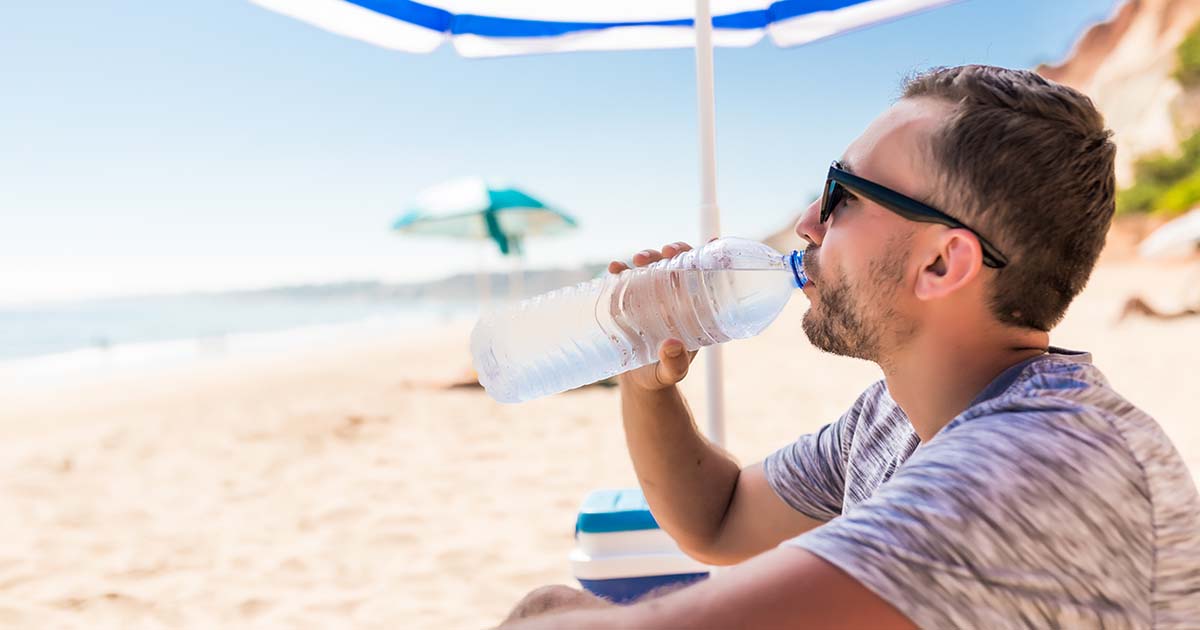 man drinking water